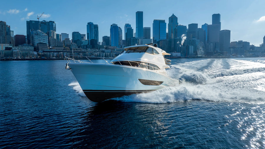 Dramatic Yacht Aerial in Front of Seattle Washington
